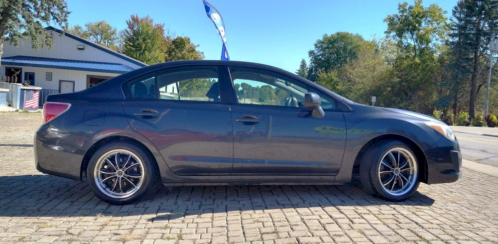 2013 Subaru Impreza 2.0i sedan. h3